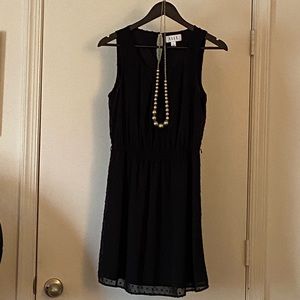 Elle black dress size 4 with free fun necklace, worn once.